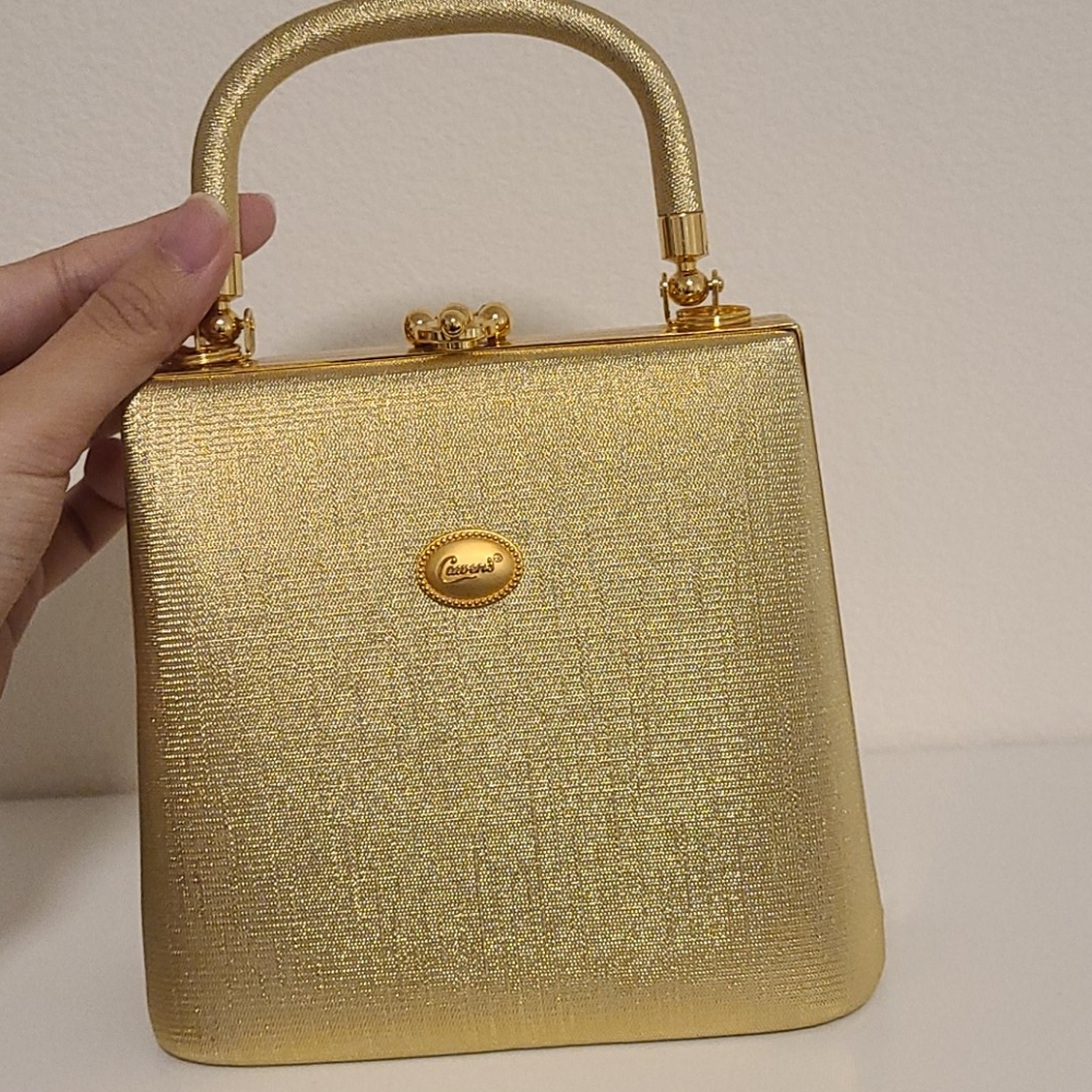 Gold hardcase purse